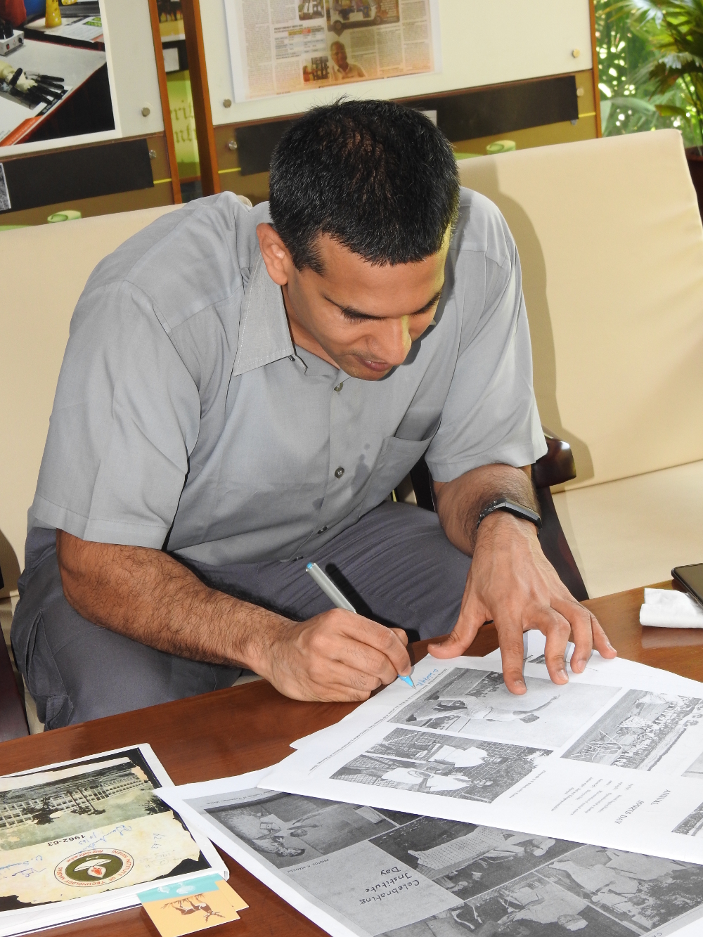 Mr. Krishna Mahesh giving his autograph in the Campastimes.
